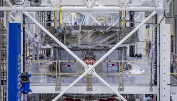 Discussion while connecting European Service Module to Crew Module Adapter. Credits: NASA–R. Sinyak