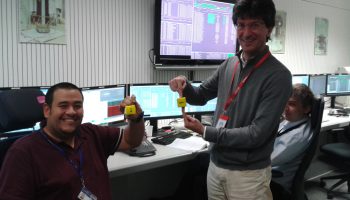 Jose Mendes and visiting scientist Daniele Bortoluzzi discussing what the test masses are doing as we perform repeated release attempts. Credit: ESA