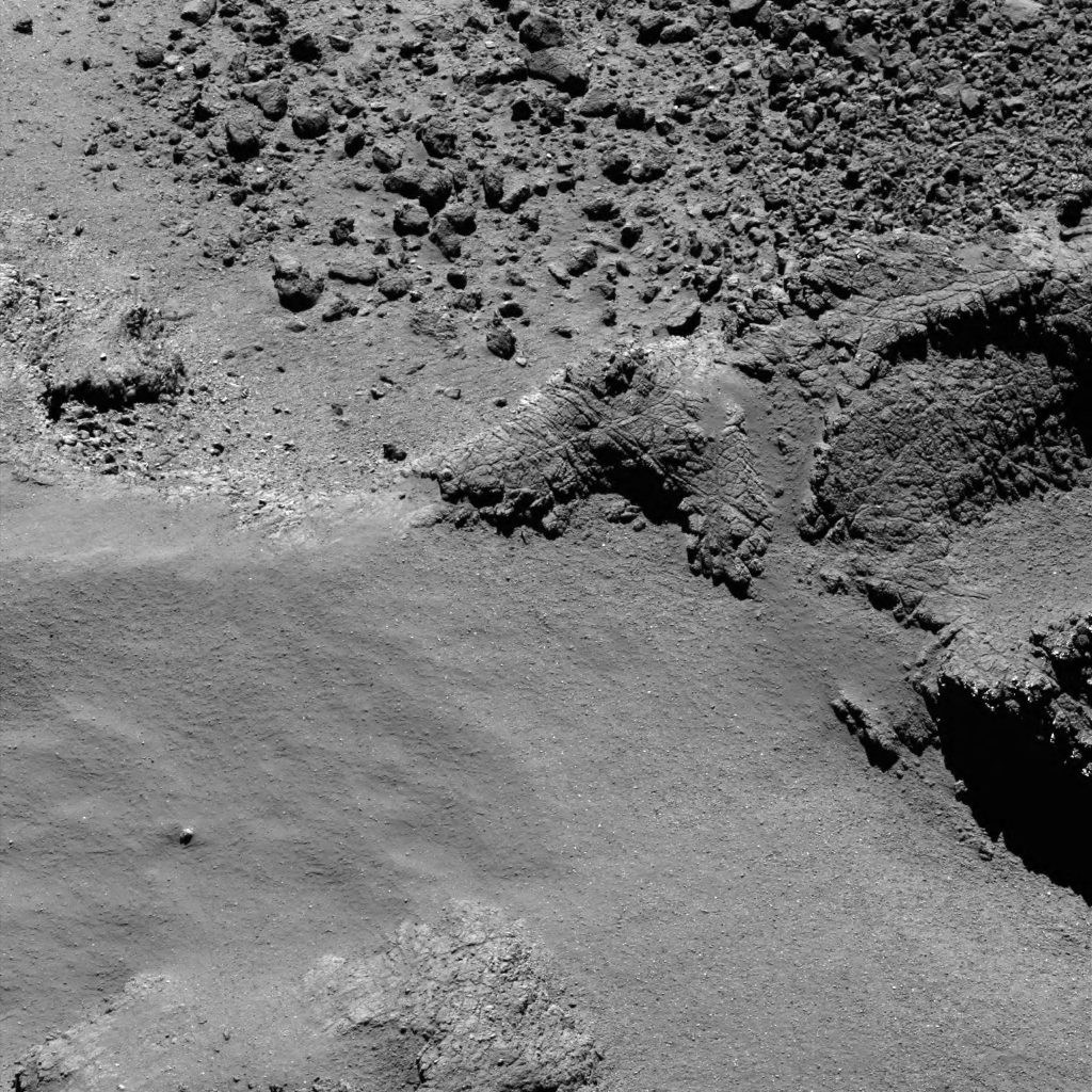 OSIRIS narrow-angle camera image taken on 3 August 2016, when Rosetta was 8.7 km from the centre of Comet 67P/Churyumov–Gerasimenko. The scale is 0.15 m/pixel at the comet and the image measures about 307 m. Credit: ESA/Rosetta/MPS for OSIRIS Team MPS/UPD/LAM/IAA/SSO/INTA/UPM/DASP/IDA