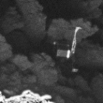 Close-up of the Philae lander, imaged by Rosetta’s OSIRIS narrow-angle camera on 2 September 2016 from a distance of 2.7 km. The image scale is about 5 cm/pixel. Philae’s 1 m-wide body and two of its three legs can be seen extended from the body. The images also provide proof of Philae’s orientation. The image is a zoom from a wider-scene, and has been interpolated. Credits: ESA/Rosetta/MPS for OSIRIS Team MPS/UPD/LAM/IAA/SSO/INTA/UPM/DASP/IDA