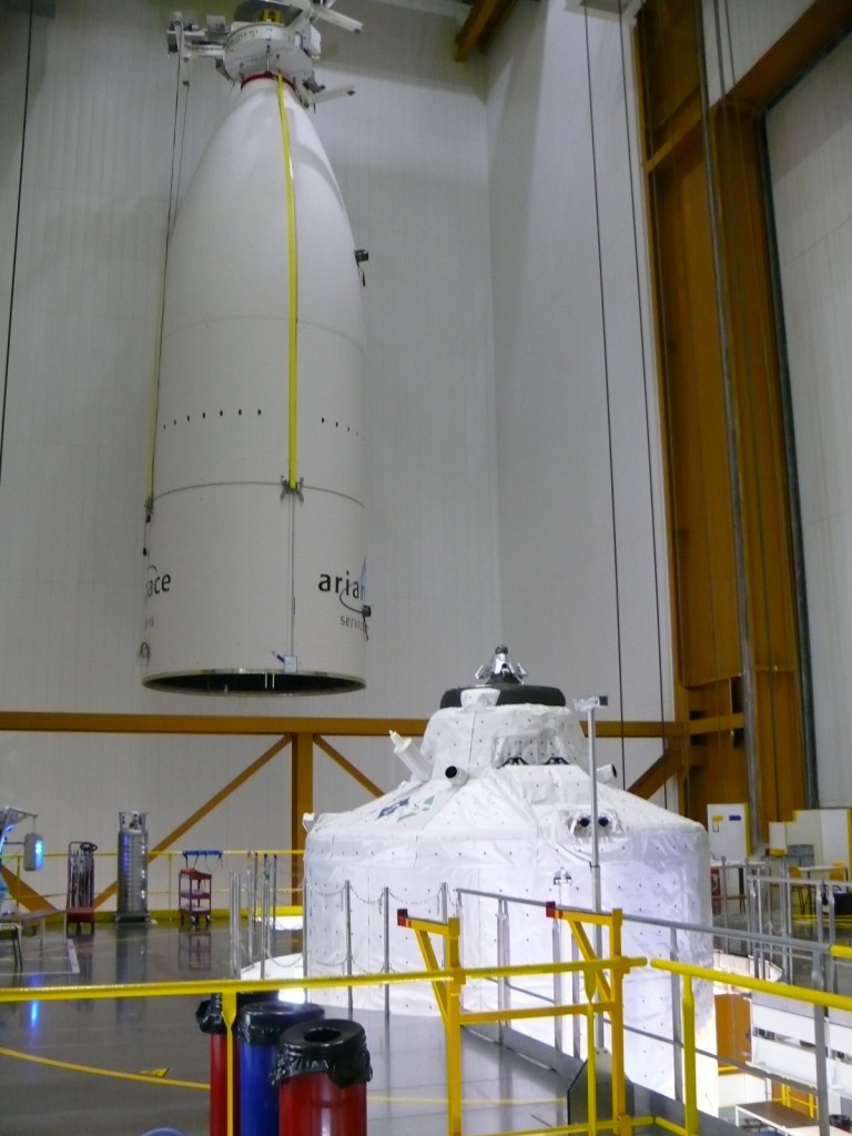 Ariane 5's huge fairing about to be lifted into place over ATV-3 Credit: ESA/A. Novelli