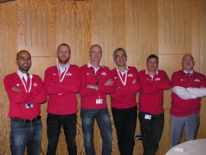 Six members of the ATV-4 team, correctly attired! (The other 13 people present at ESTEC that day for the post-flight board meeting were not 'allowed' in this picture because they had forgotten to wear their ATV-4 shirts!) Credit: ESA