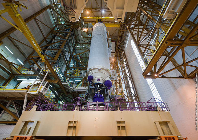 Ariane 5’s cryogenic core stage is suspended over the launch table in the Spaceport’s Launcher Integration Building. Credits: ESA/CNES/Arianespace/Optique Video du CSG