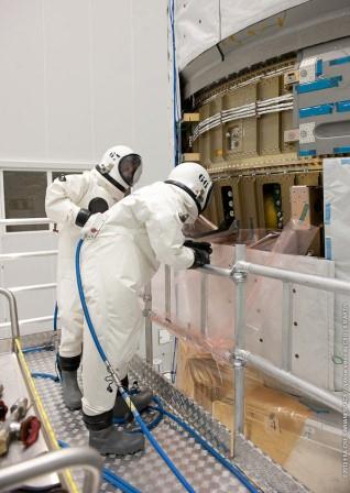 As you can see it is not the most comfortable working attire... Credit: ESA