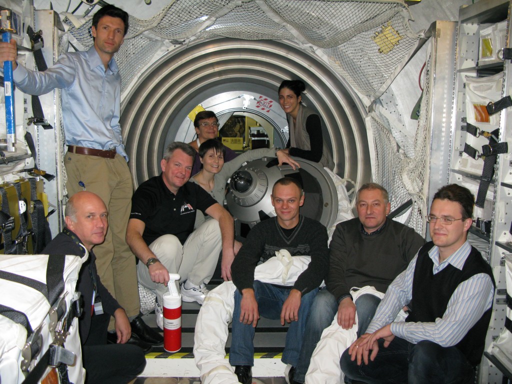 A relaxed, post-test view of the Exp41/42 crew, ESA ATV instructors (x4), Russian instructors from GCTC (1 for the ISS, 1 for Soyuz/ATV) and -- of course -- 1 translator. Photo was taken after today's successful rendezvous/docking and undocking exams. Credit: ESA