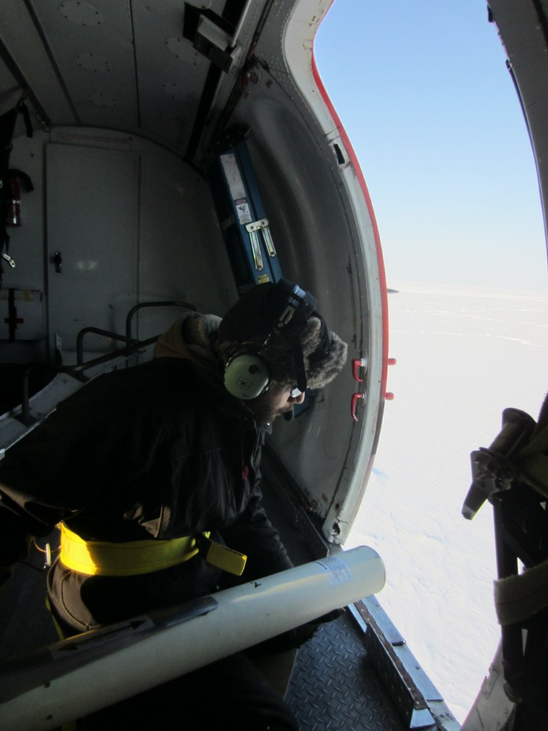Getting ready to drop an ice beacon…(A. Casey, University of Alberta)