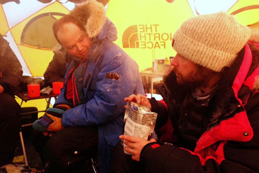 Some of the ground team huddled up in one of the tents out on the sea ice. (M. Cornelissen)