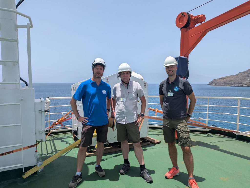 Left to right: Daniel Klocke (Max Planck Institute for Meteorology), Bjorn Stevens (Max Planck Institute for Meteorology), Jonas Von Bismarck (ESA) aboard the FS Meteor. (ESA – J. Von Bismarck)