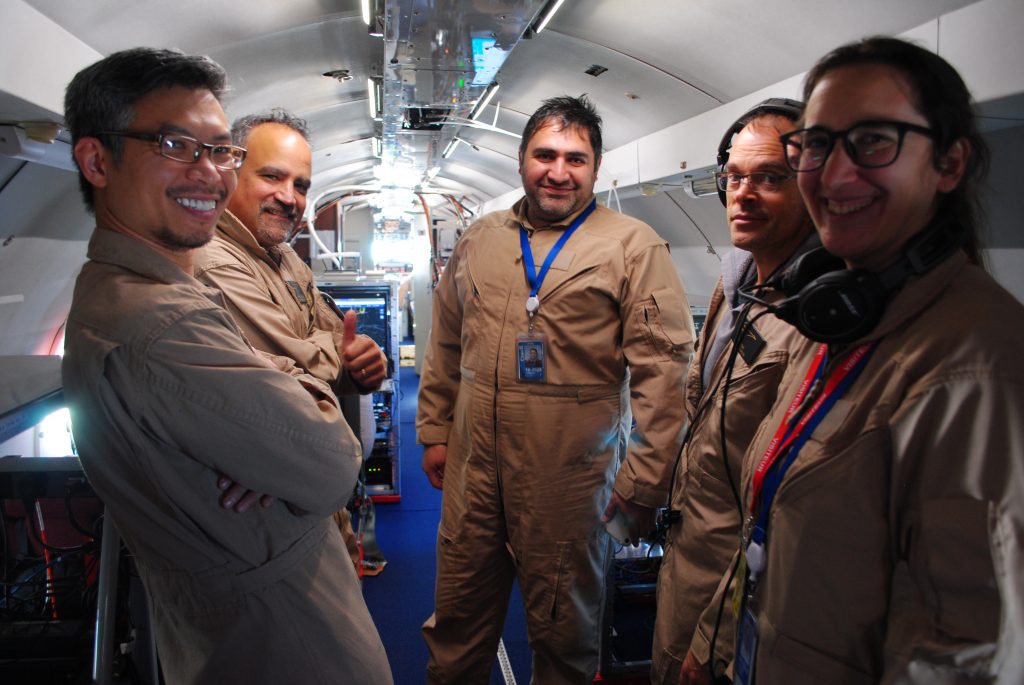 The NRC team aboard the Convair-580 during a flight. (Environment and Climate Change Canada-Zhipeng Qu)