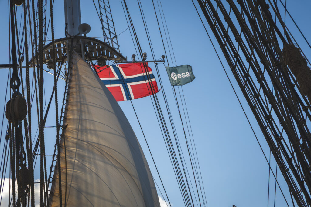 Flags against blue sky. (Ocean Media Lab)