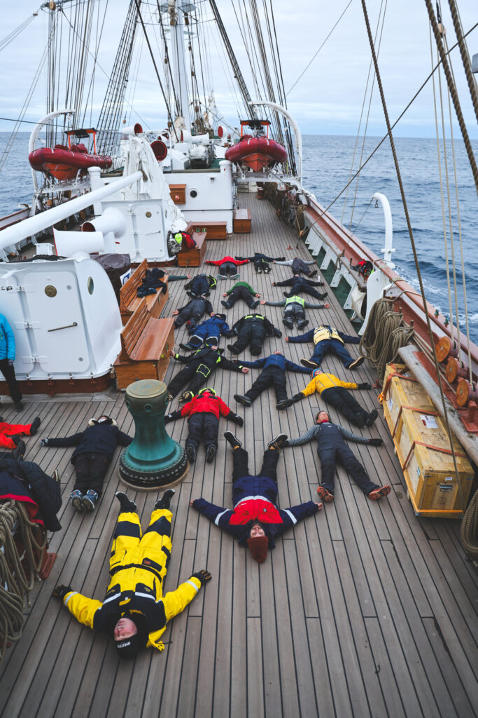 Morning yoga on deck in 2°C. (Ocean Media Lab)