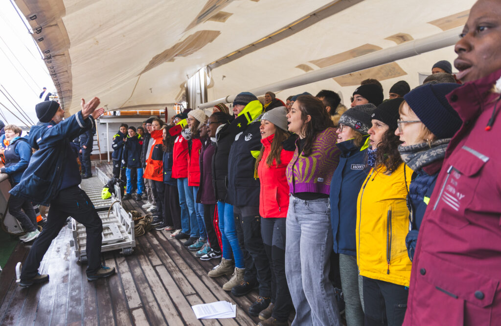 Singing a sea shanty, led by Haakon Vatle to announce our arrival in the port of Reykjavik. Later that day, we heard the echoes had carried through the town! (Ocean Media Lab)