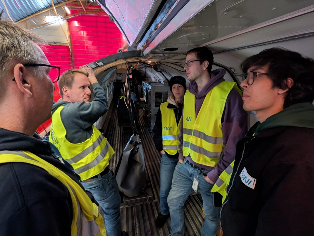Final briefing of the scientific crew before Polar 5 gets out the hangar. (Image credit: Jonas von Bismarck, ESA).