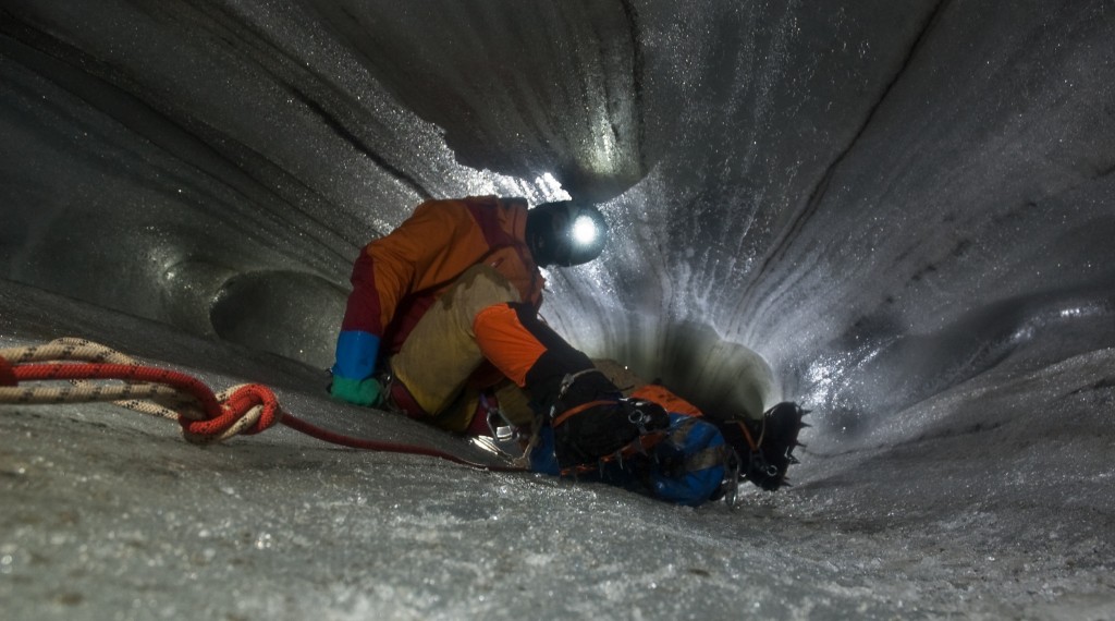 Exploring the cave glacier of El Cenote Cave, in the heart of Dolomites.