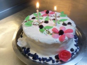  Meringue Birthday Cake with Raspberry coulis.