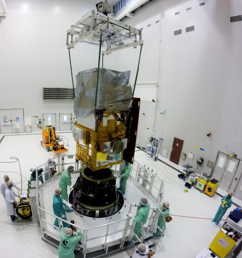 Carefully aligning the satellite to the adapter. (ESA/M. Pédoussaut)