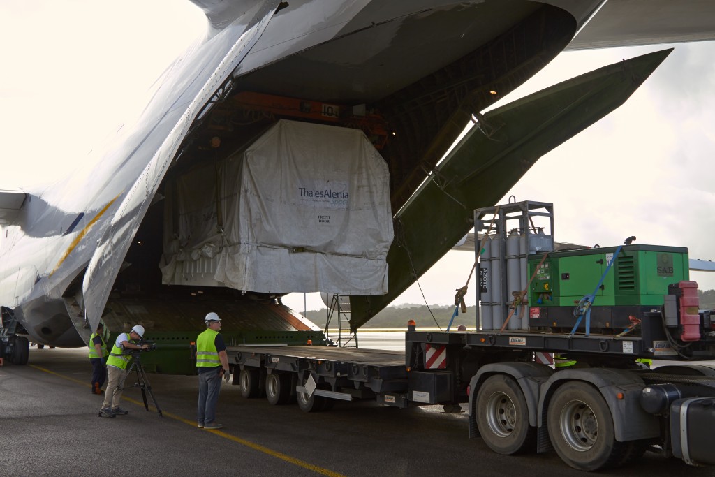 Unloading the satellite container. (ESA)
