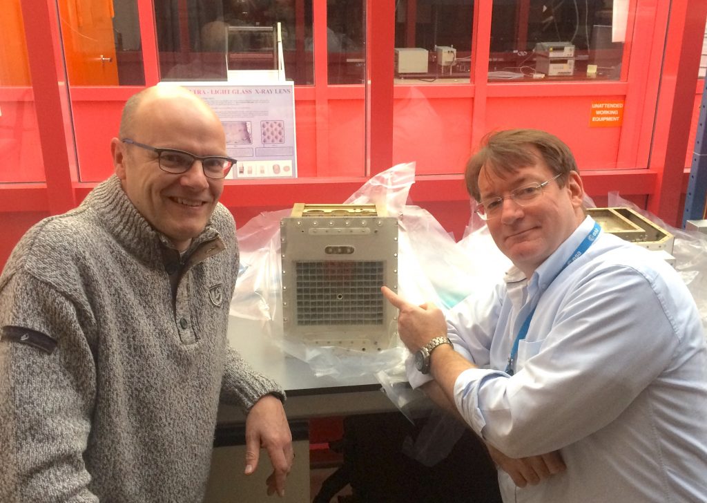 ESA Integral project scientist Erik Kuulkers (left) with the Apollo X-ray spectrometer prototype, and ESA History editor Carl Walker (right). Credits: ESA