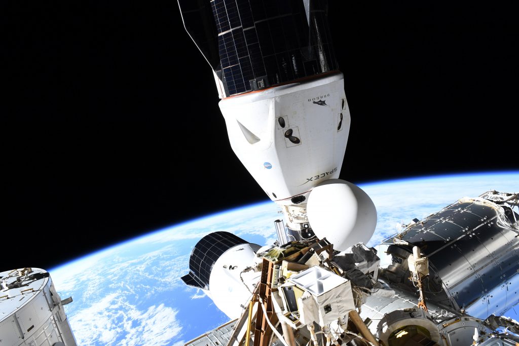 Two Dragon spacecraft in 2021 docked to two of Node-2's International Docking Mechanisms, NASA's implementation of the docking standard for the International Space Station. Credits: ESA/NASA–T. Pesquet