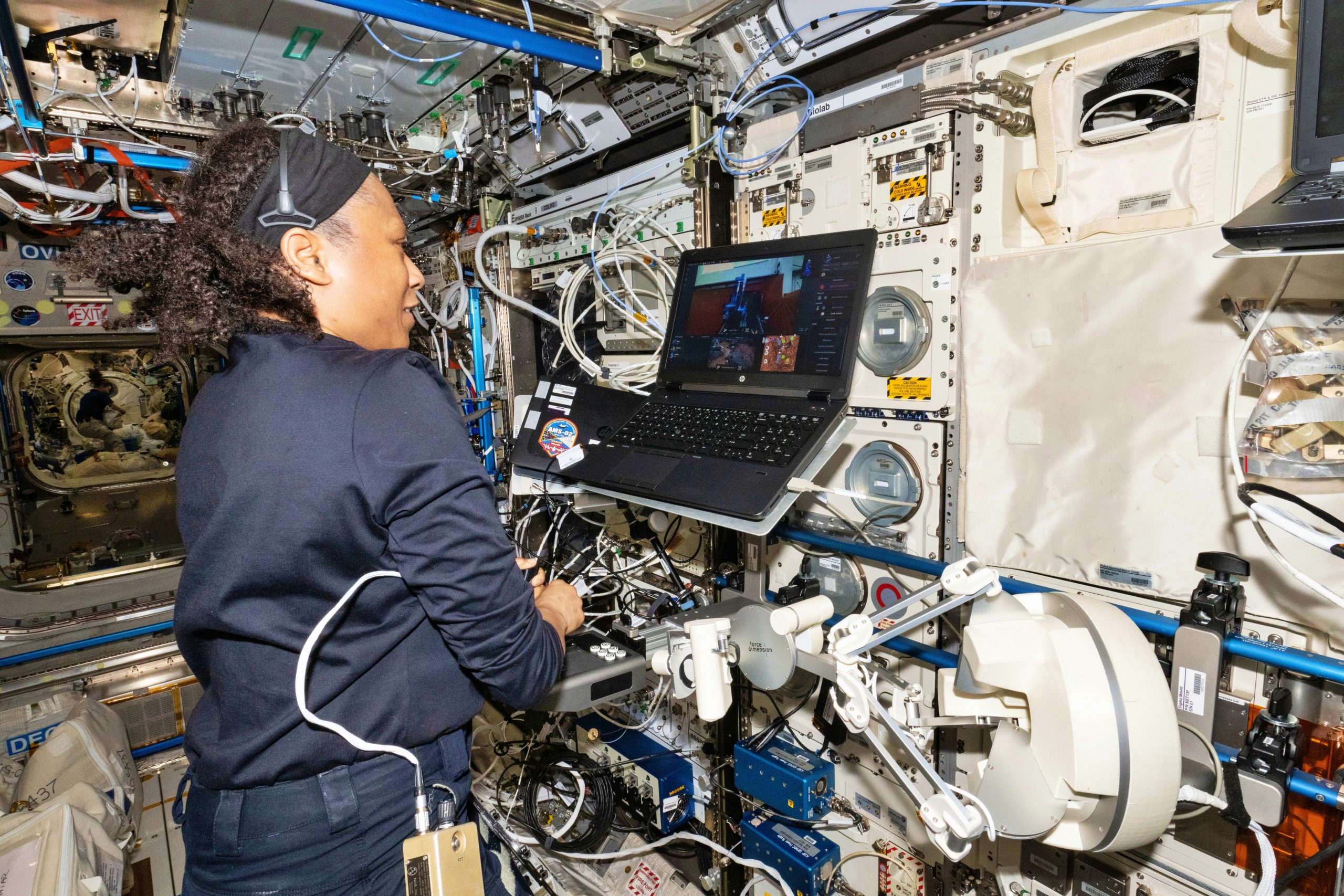 NASA astronaut Jeanette Eps operating the robots in Oberpfaffenhofen from the International Space Station. Credit: ESA/NASA