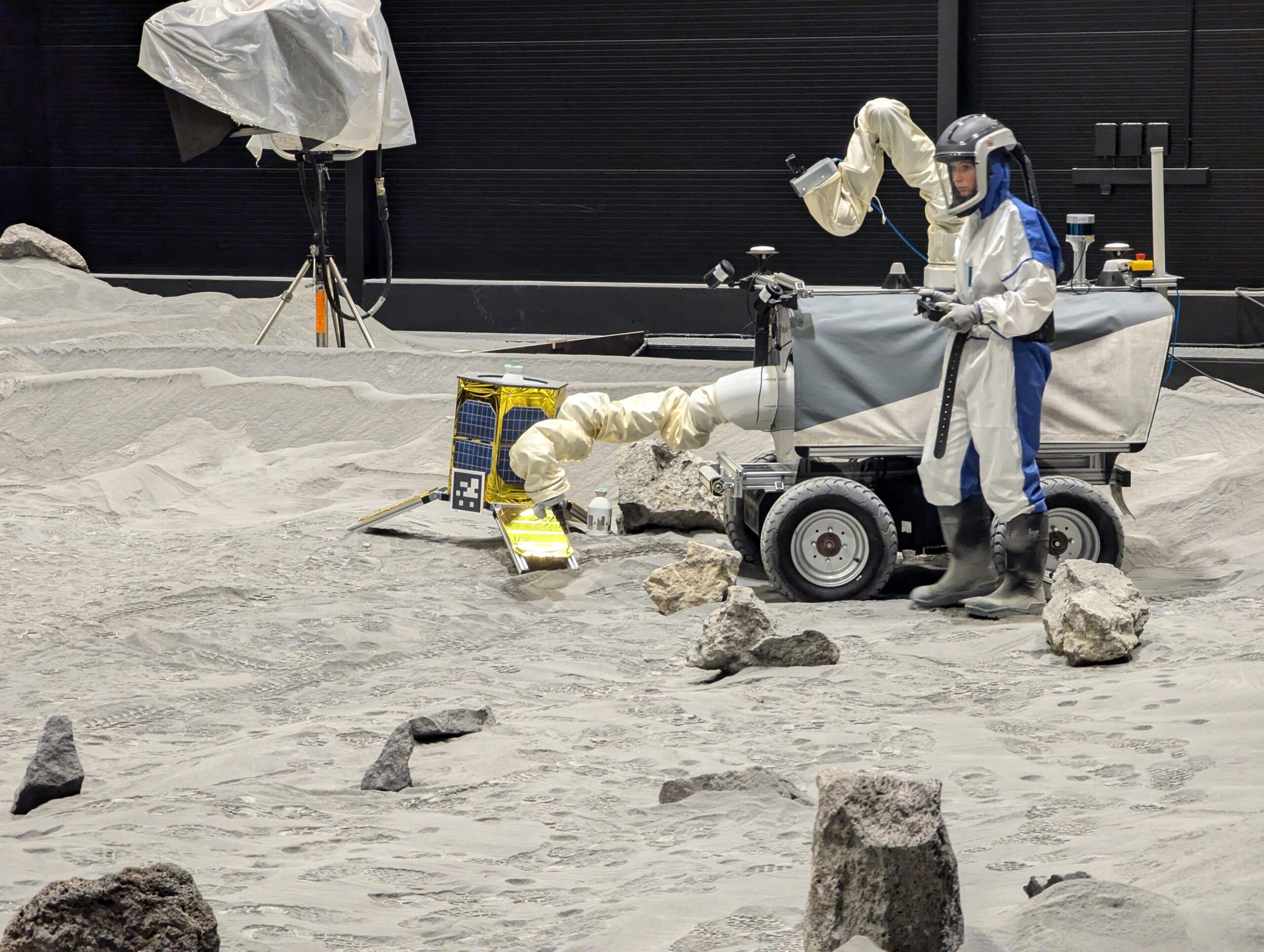 Sant uses the team’s interface system to supervise Interact and Spot at LUNA. Credit: ESA-Robotics team.