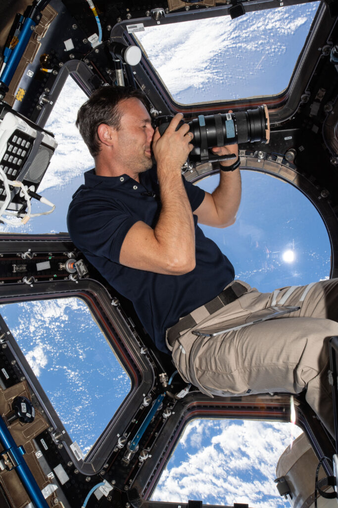 Ax-4 Mission Specialist Sławosz Uznański-Wiśniewski enjoys views of the Earth from the cupola aboard the International Space Station. Credits: NASA/Axiom Space