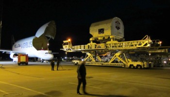 Cargo module of ATV-4 is loaded on the Beluga via rails. Credit: ESA