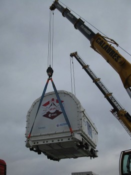A crane lifts the ICC Credit: ESA