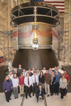 Teams at Plumbrook in front of the test article during the handover ceremony. Credits: NASA