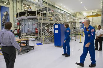 NASA astronaut candidate Kayla Barron and NASA astronaut Randy Bresnik looking at the European Service Module and Crew Module Adapter at Kennedy Space Center, 12 February. Credits:NASA–Kim Shiflett