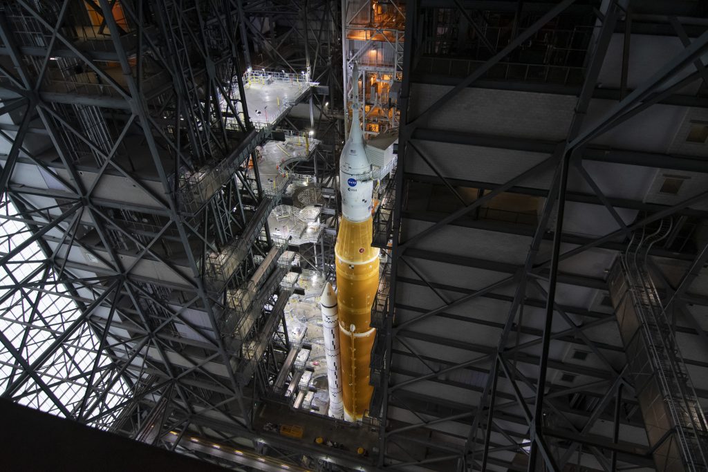 NASA's SLS rocket with Orion and the European Service Module on top at the Vehicle Assembly Building. Credits: ESA–M. Cowan