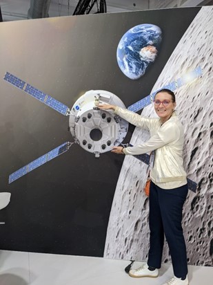 Dr Anna Chrobry points out the position of the thermal insulation on a model of the European Service Module. Credit: A. Chrobry