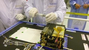 ESA's ExoMars Trace Gas Orbiter (TGO) carries two Electra radios provided by NASA. This image shows a step in installation and testing of the first of the two radios, inside a clean room at Thales Alenia Space, in Cannes, France, in June 2014. Credit: NASA/JPL-Caltech/ESA/TAS