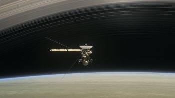 Ring Crossing: In this still from the short film Cassini's Grand Finale (https://saturn.jpl.nasa.gov/resources/7628/), the spacecraft is shown diving between Saturn and the planet's innermost ring. Credit: NASA/JPL-Caltech