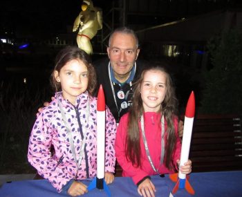 ESA's Alessandro Ercolani helping kids construct their first rocket. Image credit: Unknown
