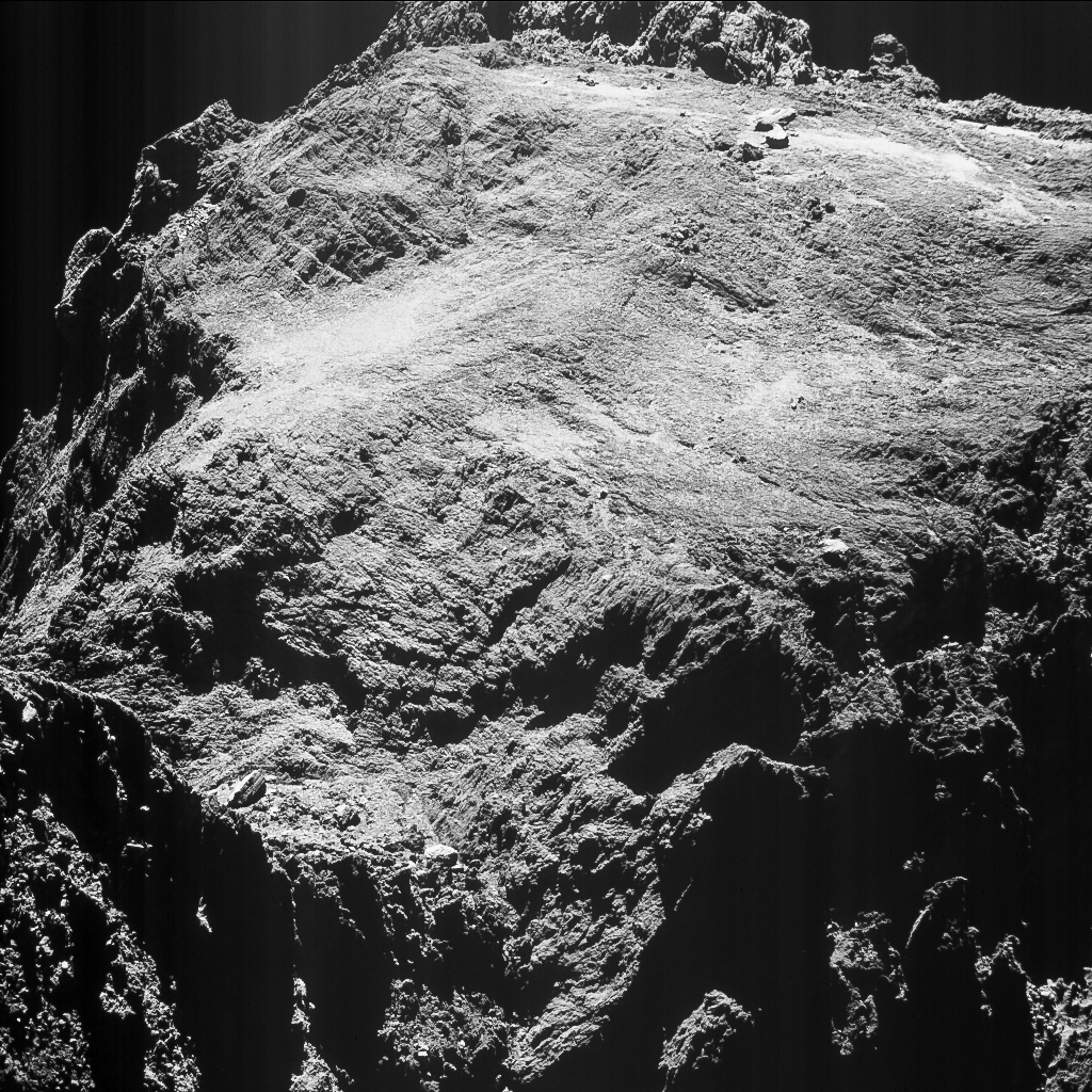 Enhanced NAVCAM image of Comet 67P/C-G taken on 15 May 2016, 9.88 km from the nucleus. The scale is 0.84 m/pixel and the image measures 862 m across. Credits: ESA/Rosetta/NAVCAM – CC BY-SA IGO 3.0
