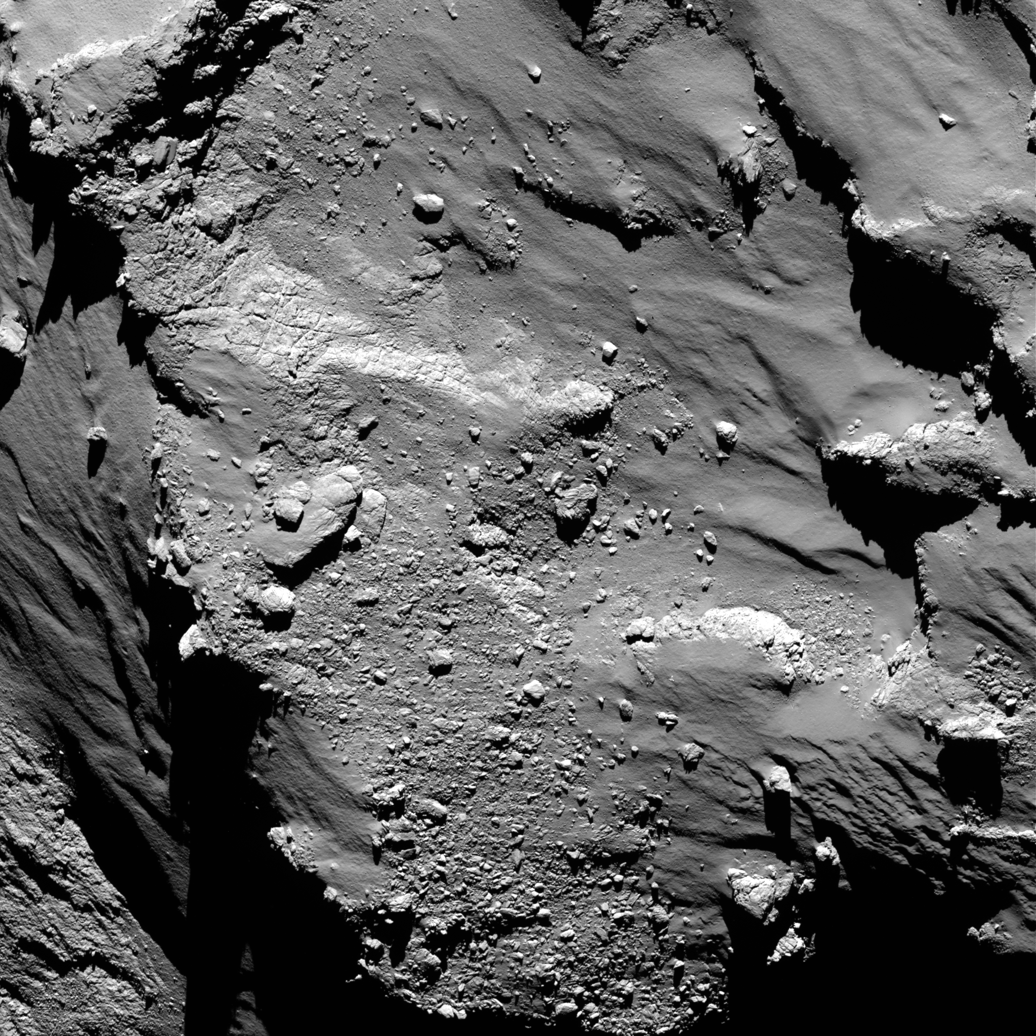Can you spot Philae in this image taken during the landing on 12 November 2014? Credits: ESA/Rosetta/MPS for OSIRIS Team MPS/UPD/LAM/IAA/SSO/INTA/UPM/DASP/IDA