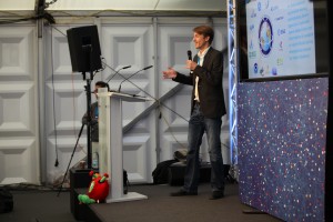 Jens Danzeglocke from DLR address the SpaceSocial tent from the stage 