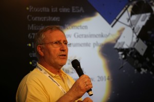 Dr. Gerhard Schwehm on stage at SpaceSocial explaining the Rosetta spacecraft and mission