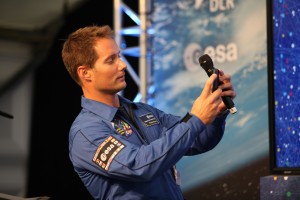 Thomas Pesquet juggles his camera and microphone to take a photo of fellow ESA astronaut Alexander Gerst