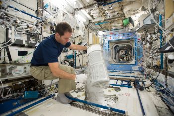 Thomas working with the Space Station freezers. Credits: ESA/NASA