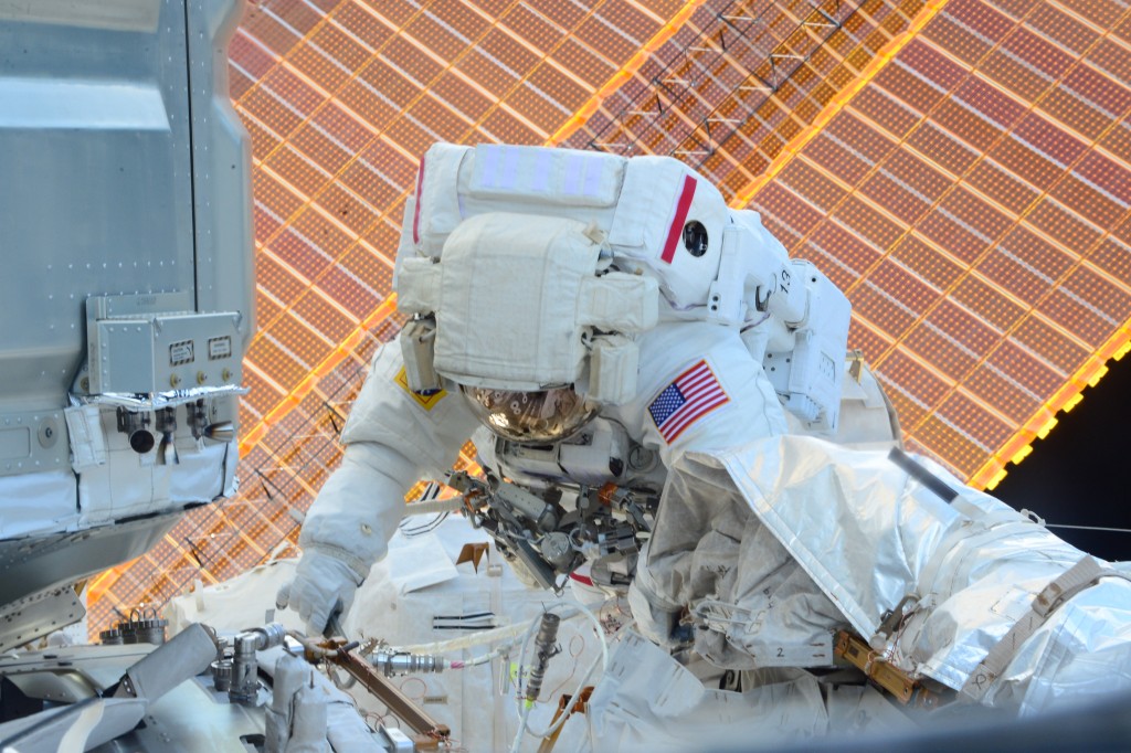 Spacewalk to move Mobile Transporter. Credits: ESA/NASA