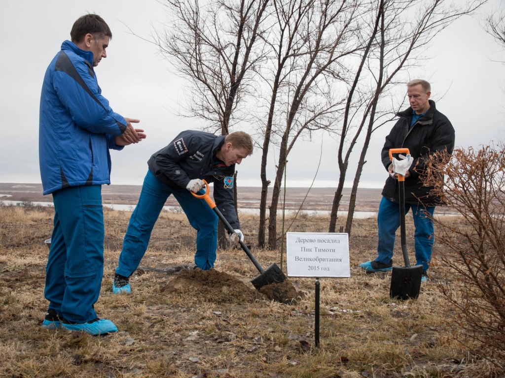 Tim, Yuri and Tim during tree planting. Credits: NASA-V. Zelentsov