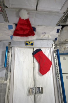 Tim's Christmas stockings in space. Credits: ESA/NASA